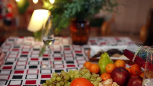 Christmas Gift Exchange Between Friends at Home