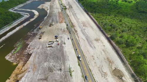 Aerial View of American Highway Under Construction with Moving Traffic
