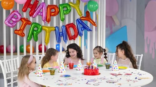 Children Celebrating Birthday Party with Cake and Balloons