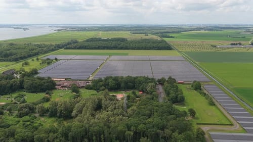 Vast solar installation across fields, industrial capacity, Netherlands