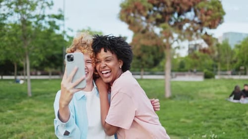 Multiethnic Friends Taking Selfie in a Park