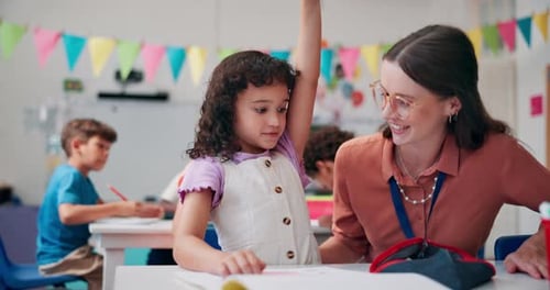 Teacher Helping Student in a Classroom Setting