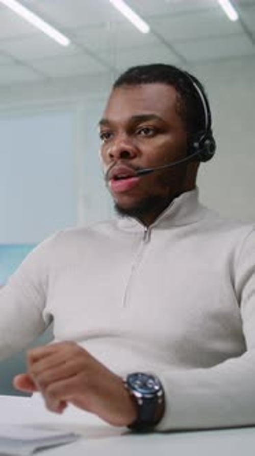 Young Adult Working in Modern Bright Office