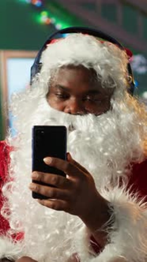 Vertical Video Cheerful Saint Nicholas Listening to Festive Carols Christmas Music on Phone