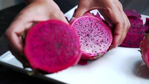 Close up of Red and white dragonfruit Red Dragon Fruit Slices and Cultivating Exotic Plants pitaya