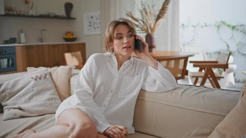 Relaxed Woman Talking Smartphone Sitting Cozy Sofa Home Closeup Smiling Lady