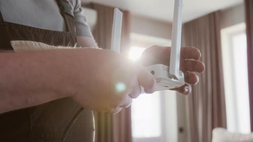 Connecting Cable to White Router Indoors