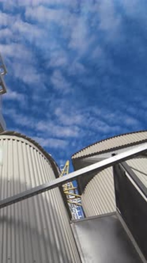 Metal construction of industrial plant. Industrial equipment of a modern agricultural complex