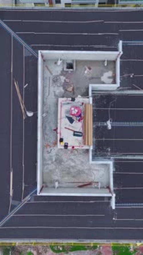Vertical Video of an Open Frame of a Modern Building With a Clear View of the Steel Structure and