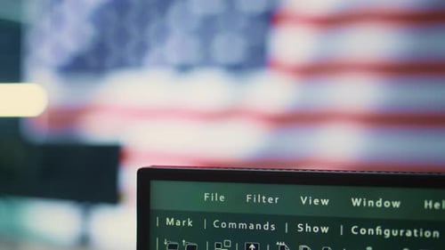 Computer Screen with United States Flag Background