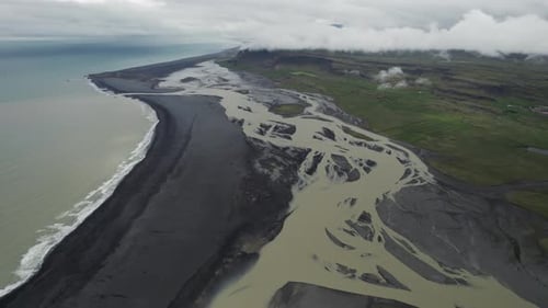 Aerial view of endless coastline near the river estuary, Iceland.