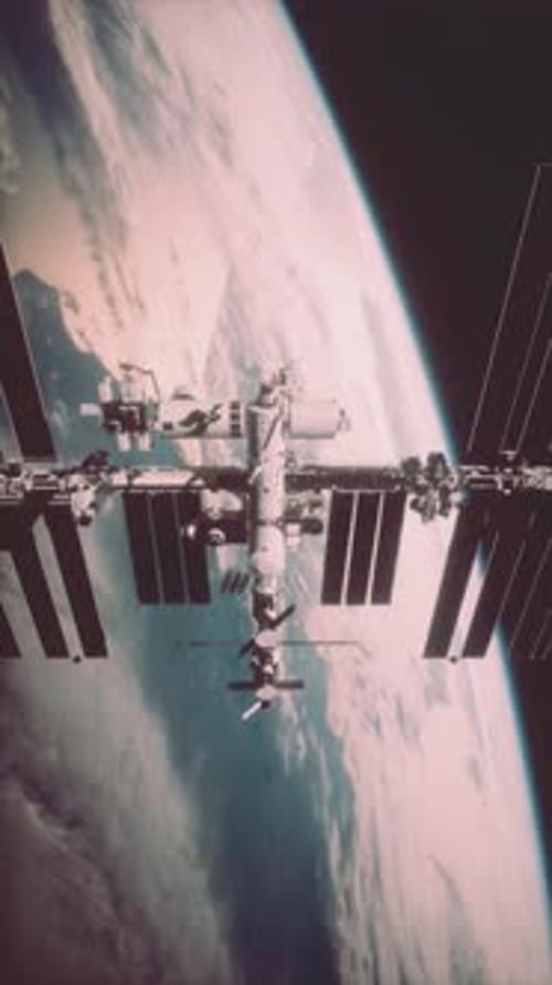 International Space Station Rotates Solar Panels In Outer Space