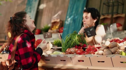 Customer and Vendor at Colorful Outdoor Market