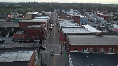 Cars Travel Road in American City Aerial View
