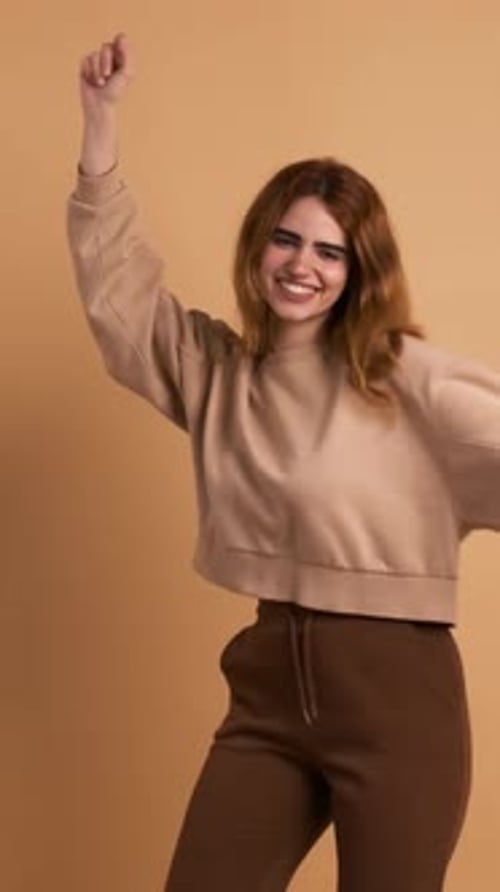 Joyful Woman Dancing in Casual Fashion Style