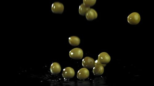 Green Peas Falling in Slow Motion