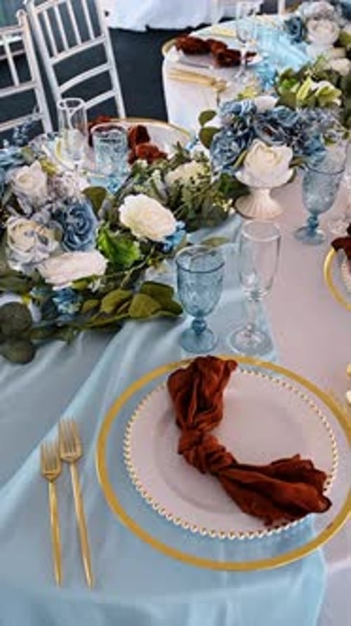 Elegant Wedding Table Setting with Blue and Gold