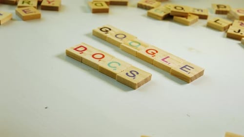 Block Letters Spelling "Dogs Google" Close Up