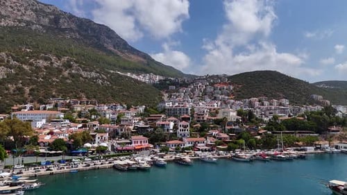 Aerial View of Kas Coastal Town with Marina and Hills in Turkey