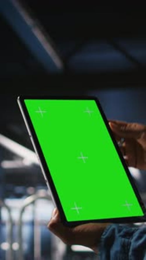 Vertical Video Close Up of Server Hub Admin Using Isolated Screen Tablet Next to Colleague