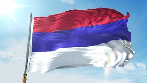 Waving National Flag Against Sunny Blue Sky