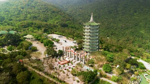 Aerial Perspective Revealing Linh Ung Pagoda Nestled Within Verdant Son Tra Peninsula Showcasing