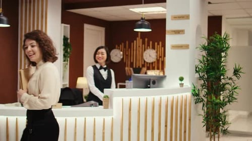 Hotel Manager Suggesting Hotel Extras