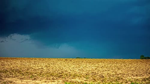 Timelapse of severe thunderstorm developing over farmland