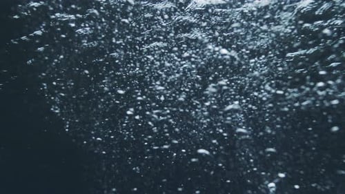Mesmerizing Air Bubbles and Abstract Ocean Backdrop
