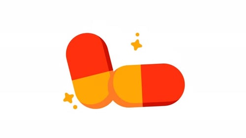 Deux pilules oranges et jaunes avec des étoiles