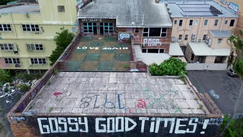 Drone aerial close-up urban decay building Gossy Good Times CBD centre abandon derelict building win