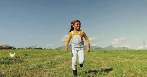Child, running or girl on chicken farm in agriculture, farming or agro environment freedom