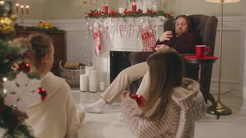 Cozy Christmas Scene with Family and Decorations