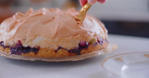 A Freshly Baked Rhubarb Cake Topped with Fluffy Meringue