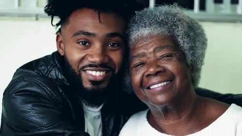Smiling Man and Woman Posing Together Indoors
