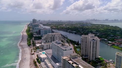 Miami beach turquoise ocean view flyover by aerial drone in south Florida
