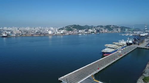Moving forward with Drone in the largest port in Latin America, anchored ships, cargo and container