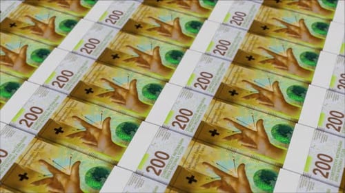 200 SWISS FRANC banknotes printing by a money press