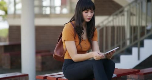 Student, happy woman and tablet on campus, university or college for e learning research