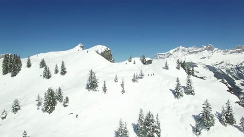 A Breathtaking Winter Landscape Featuring Majestic and SnowCovered Mountains in Full View