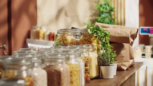 Jars of Pasta and Dried Goods on Table