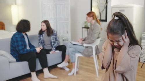Distressed Child Reacts to Parents Arguing in Therapy