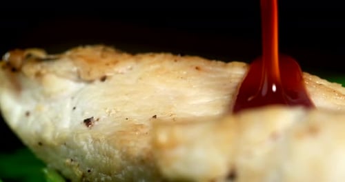 Close Up of Sauce Poured on Chicken