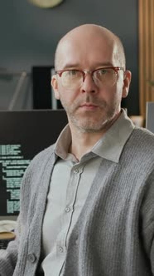 Vertical Portrait of Confident Male Software Developer in Modern Office