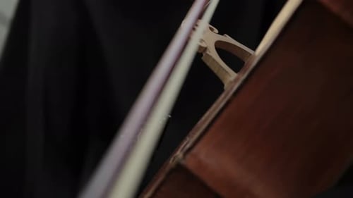 Close Up of Cello Being Played with Bow