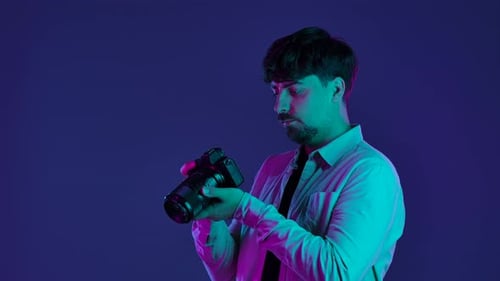 Backstage Photographer in Studio Shooting with Camera