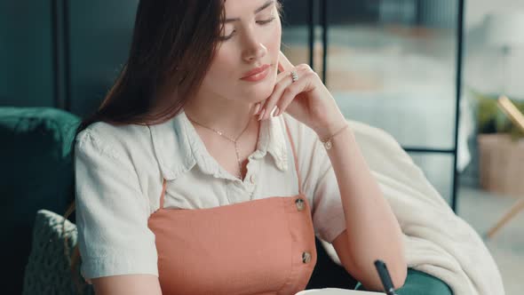 Woman Writing in Notebook, Contemplative Home Scene, Education Stock ...