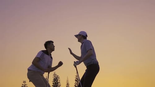 Friendship Golfing team jump have a nice score with club at golf course