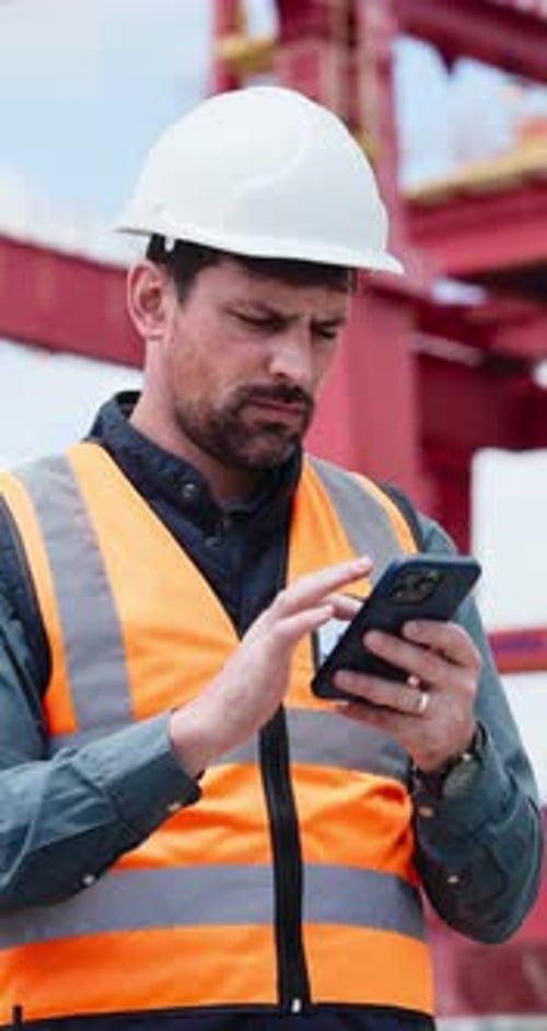 Man, logistics and phone in shipping yard for research, delivery schedule and confirm shipment