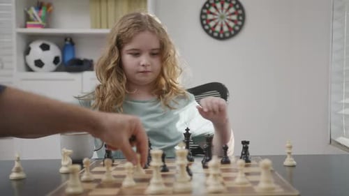 Kid Focusing on Chessboard Pieces Child Learning Decision Making with Chess Kid Practicing Chess